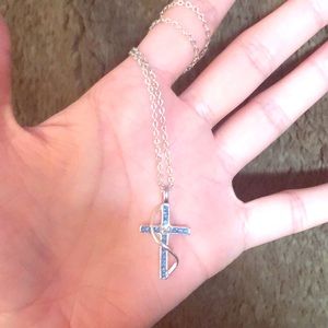 Silver cross necklace with blue studs